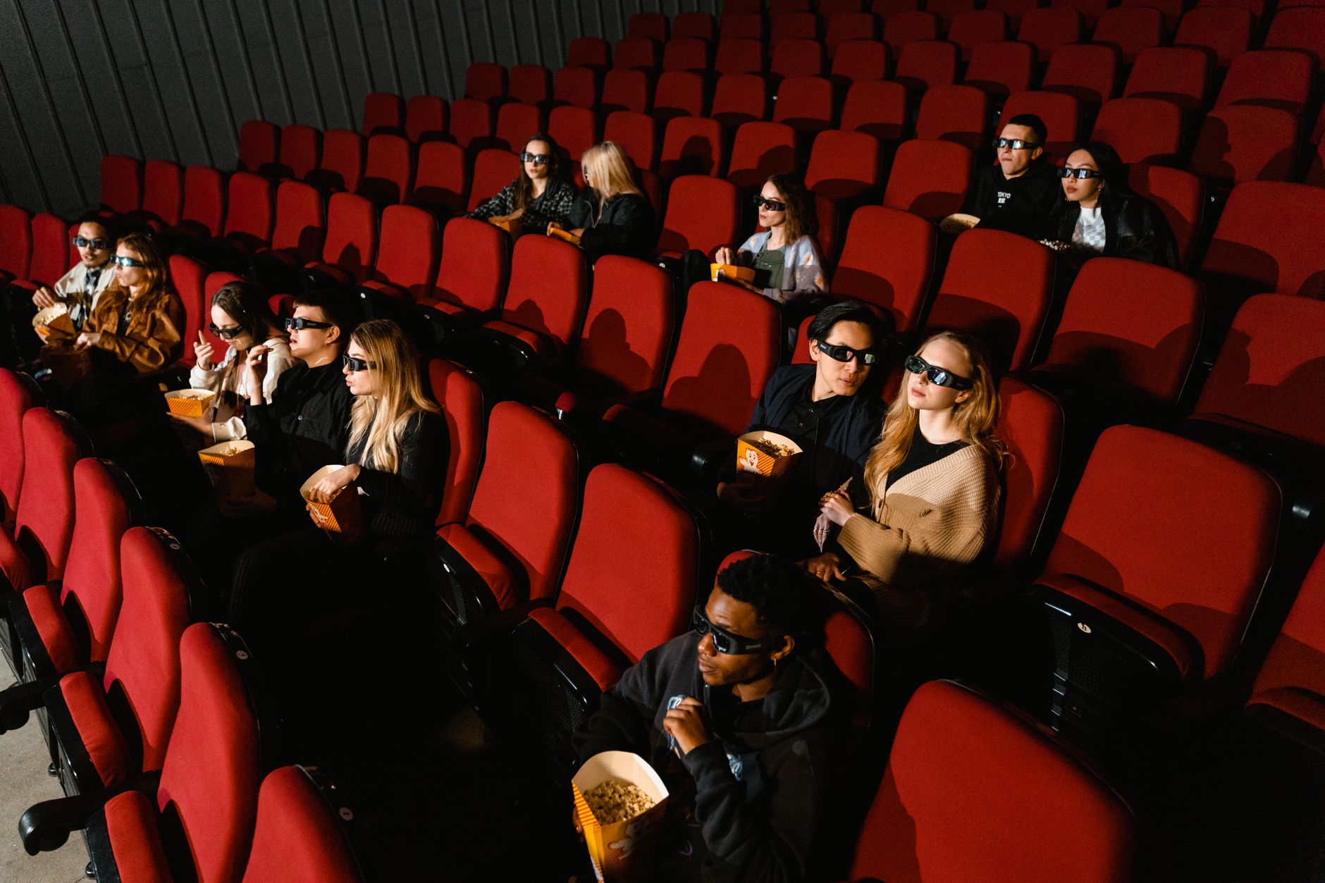 Audience watching a film at a movie festival screening