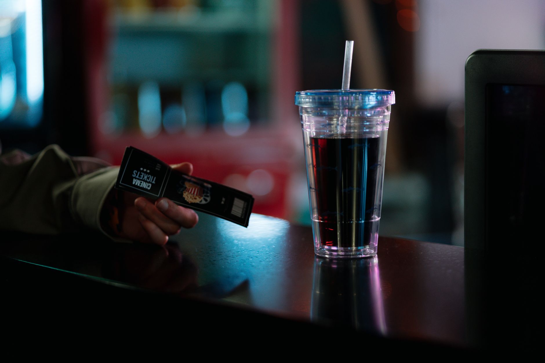 Cinema tickets and a drink on a counter before a Sundance screening