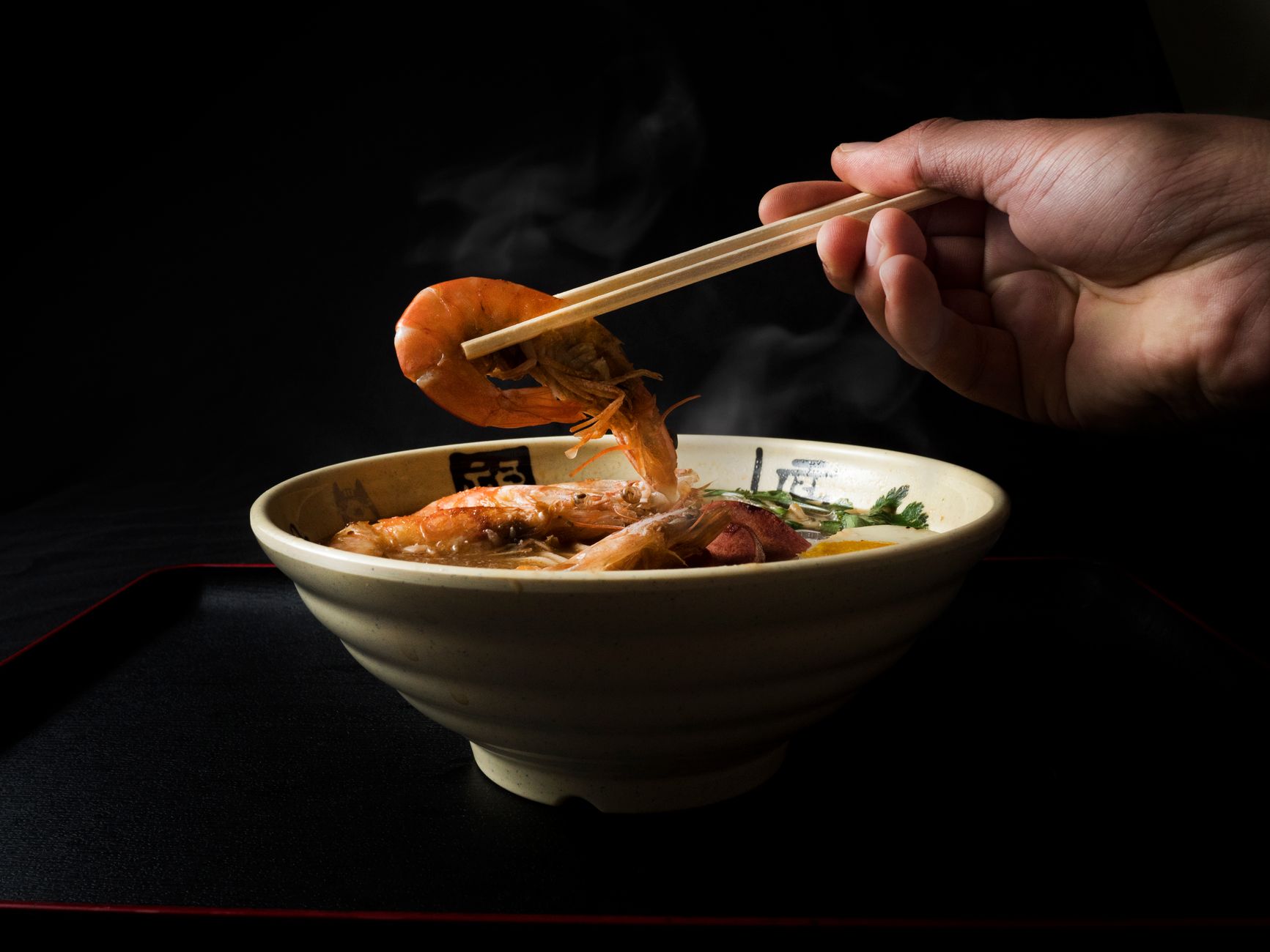 Bowl of ramen with chopsticks