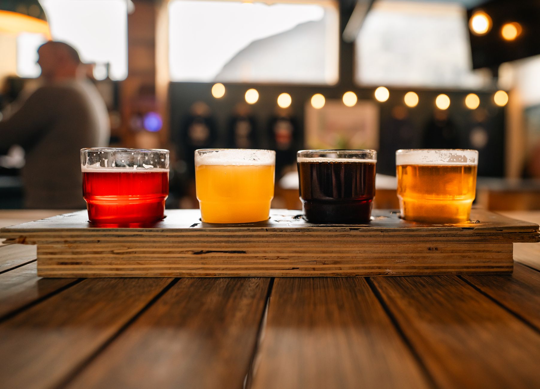Flight of craft beers on a taproom bar