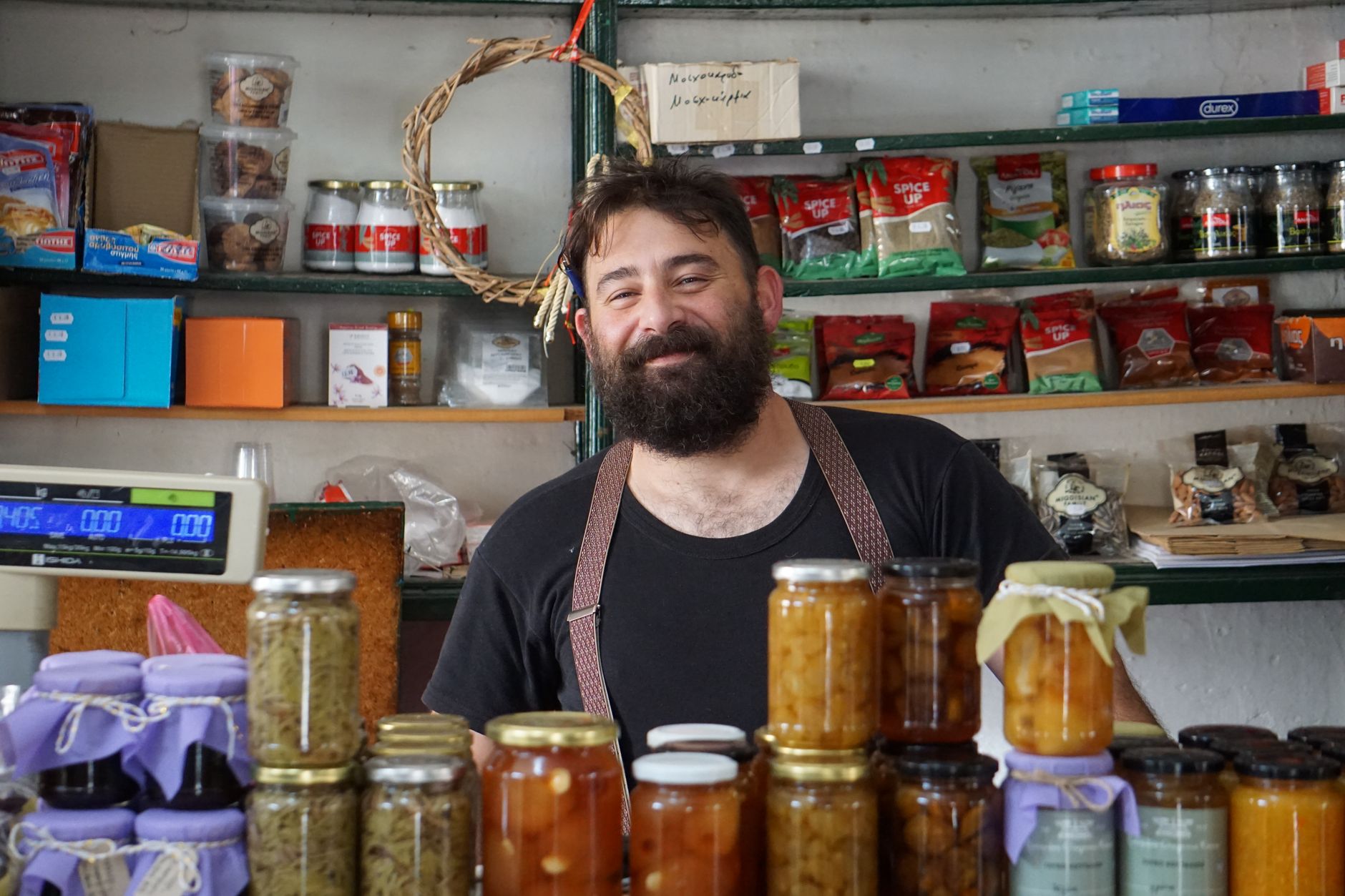 Small business owner standing in their shop