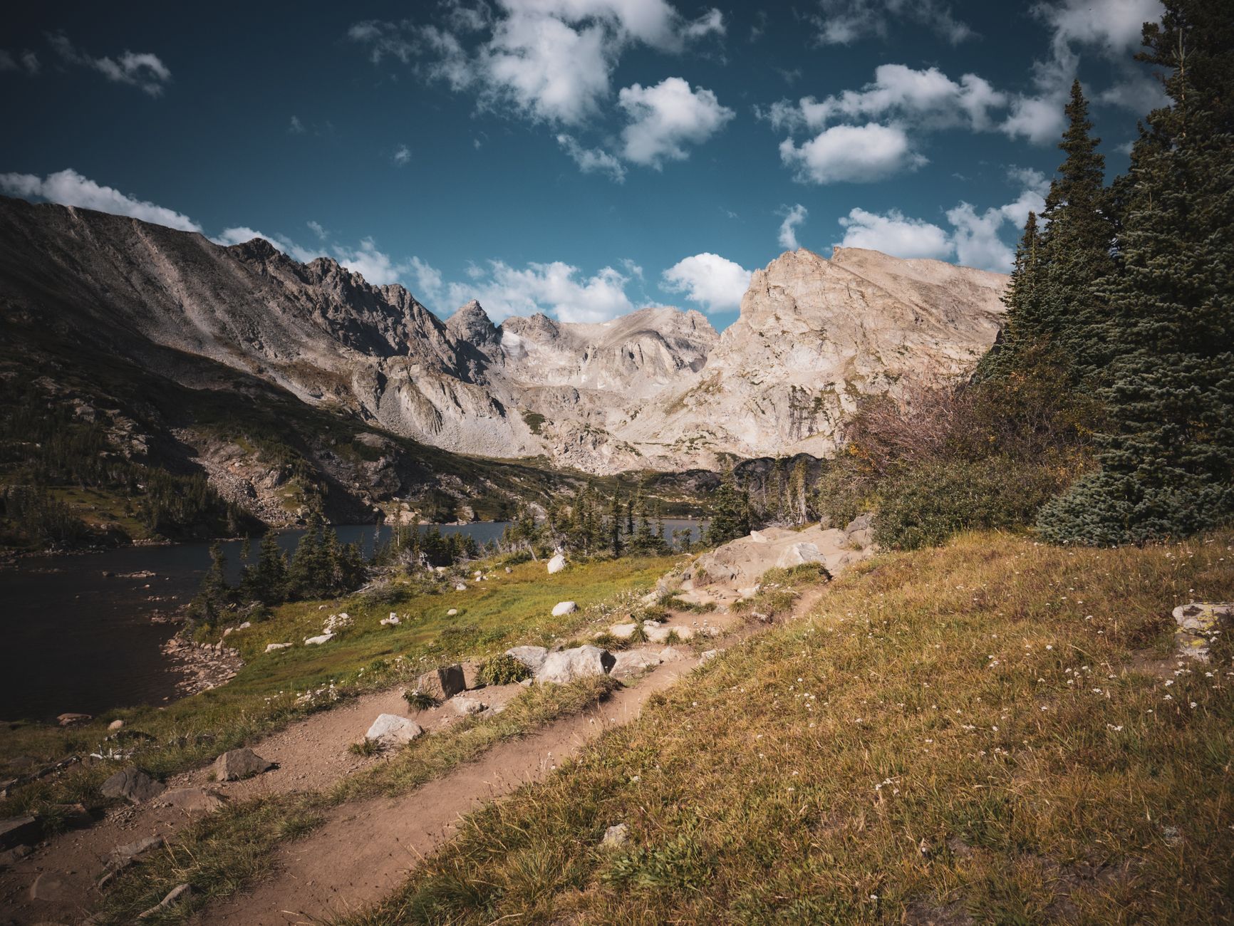 Hiking trail winding through the Colorado Rockies