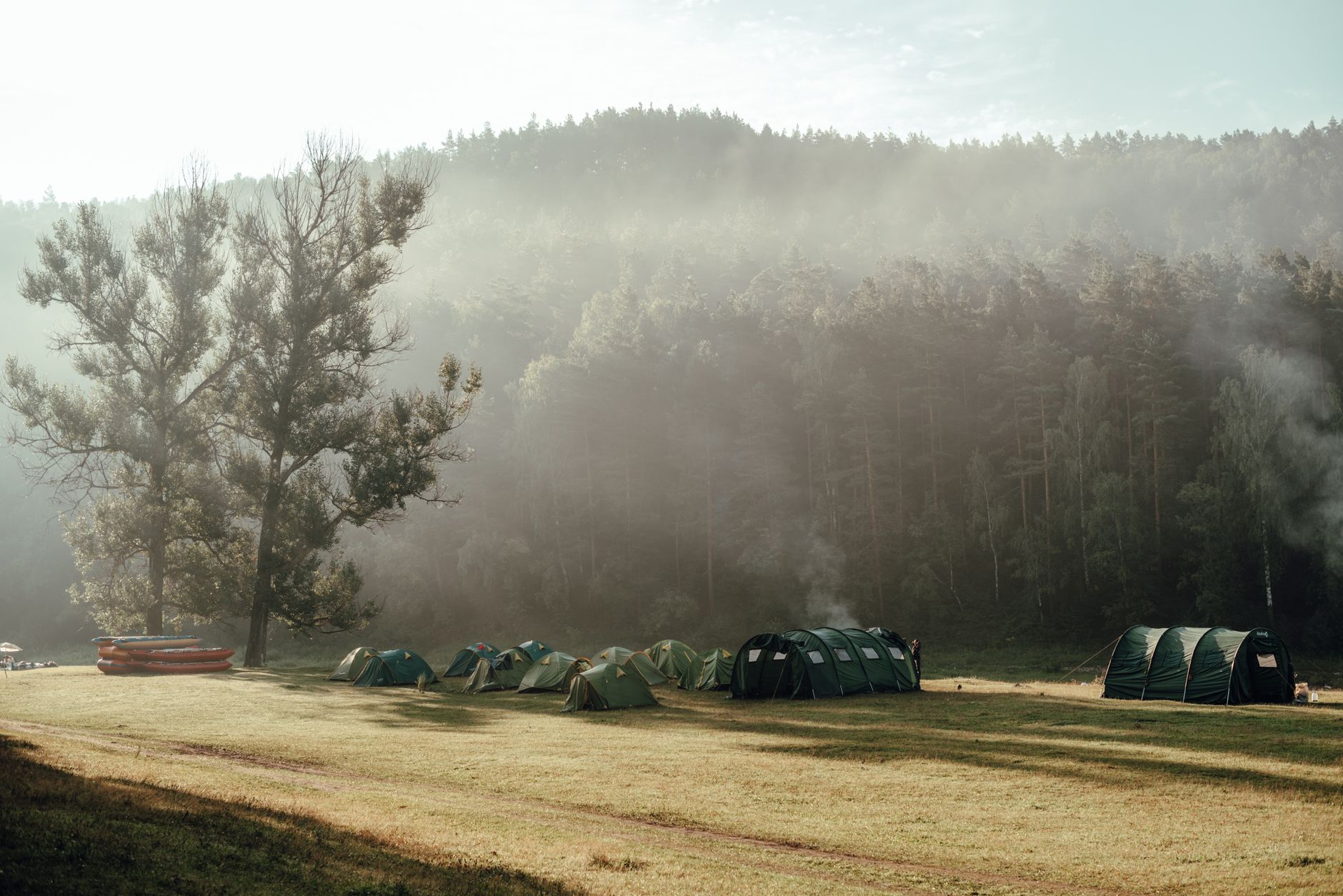 Tents at a misty forest campsite near Boulder