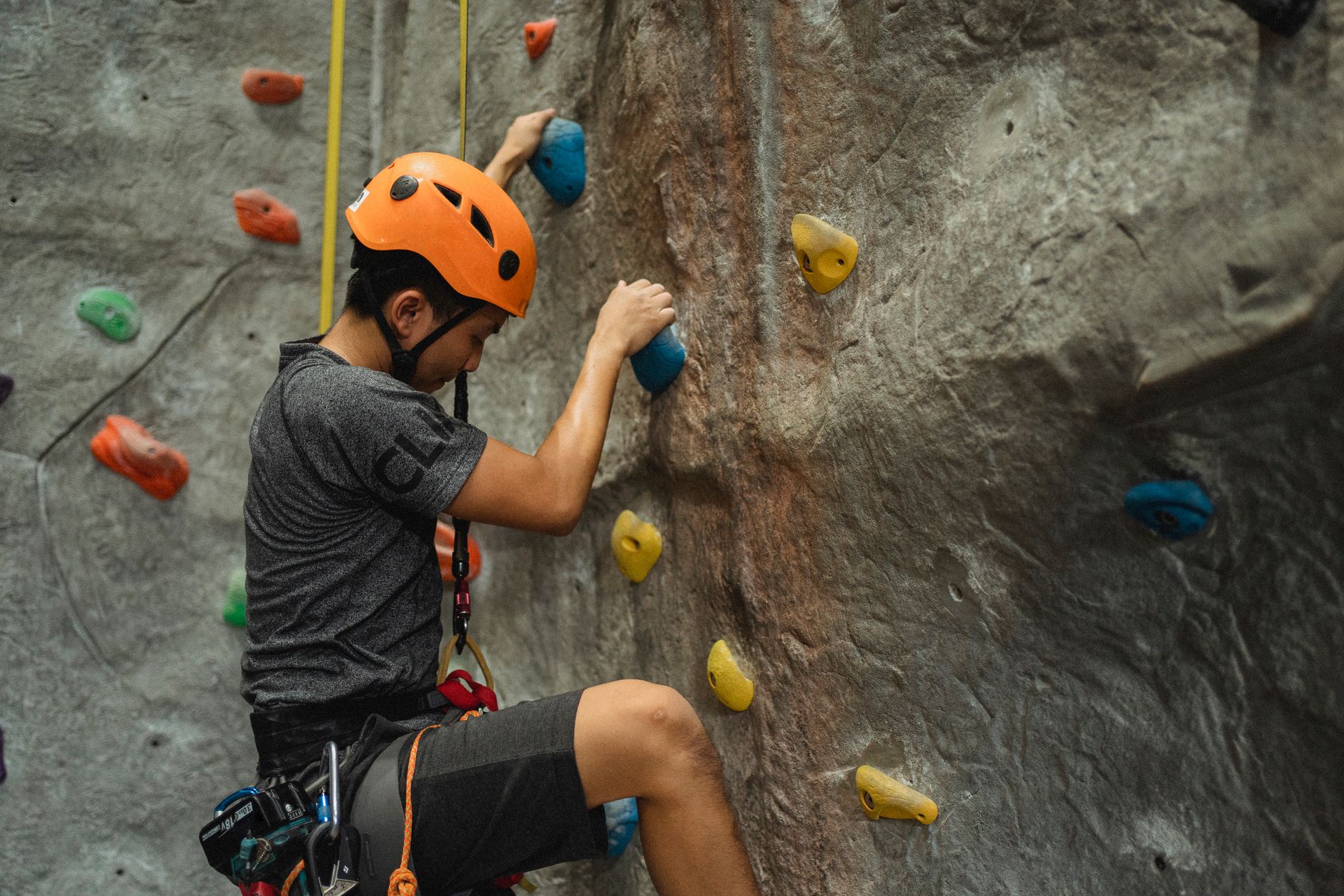 Climber on an indoor climbing wall