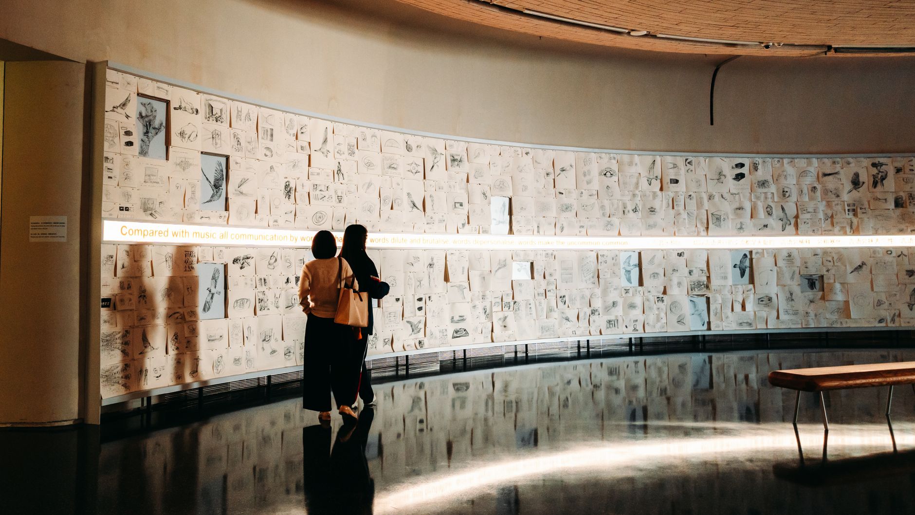 Visitors viewing a museum exhibit