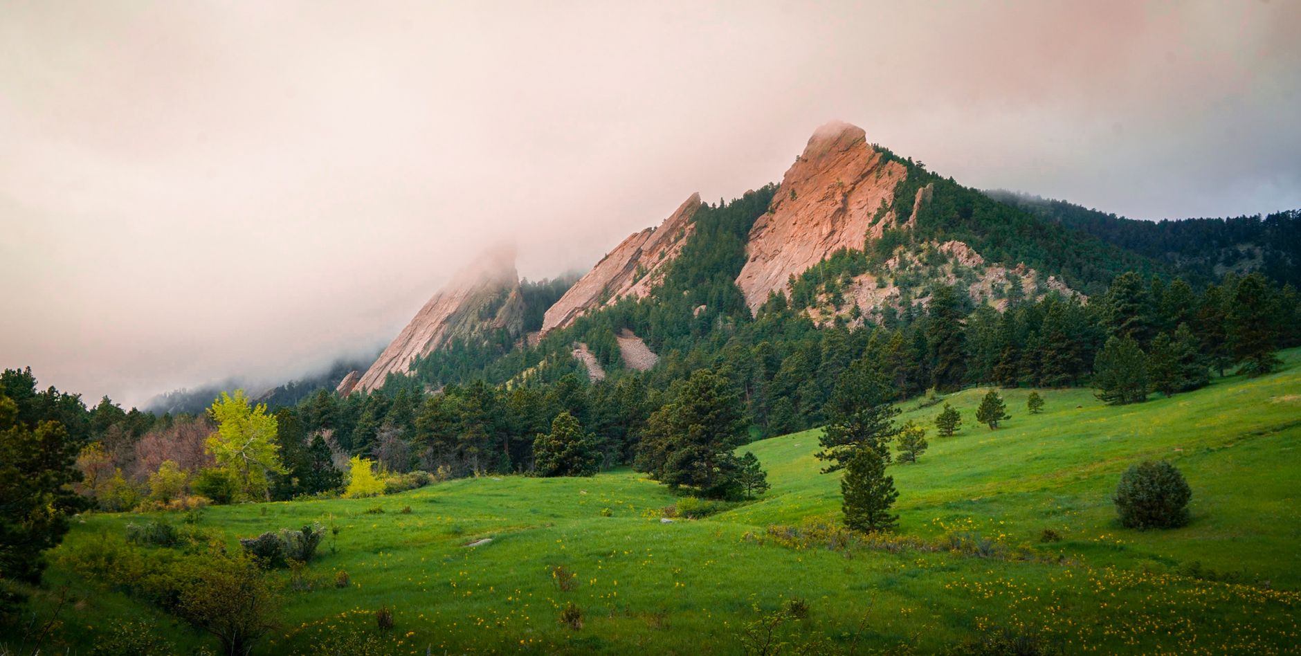 Morning mist below the Flatirons in Boulder, Colorado