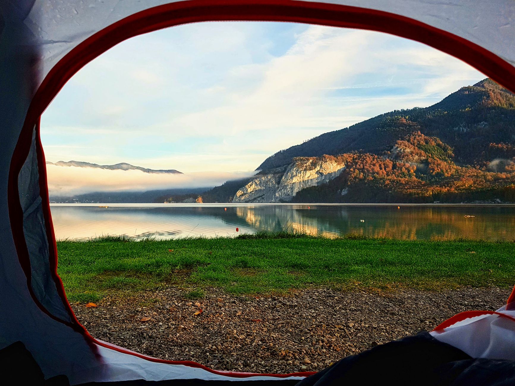 Campsite with a view of a mountain lake